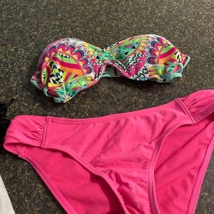 Three bathing suits and can sold as a lot or separately.